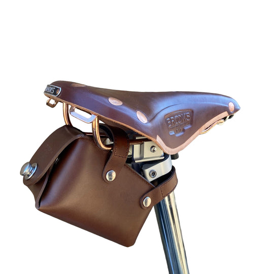 Brompton Leather Saddle Bag brown with silver hardware normal size white Background