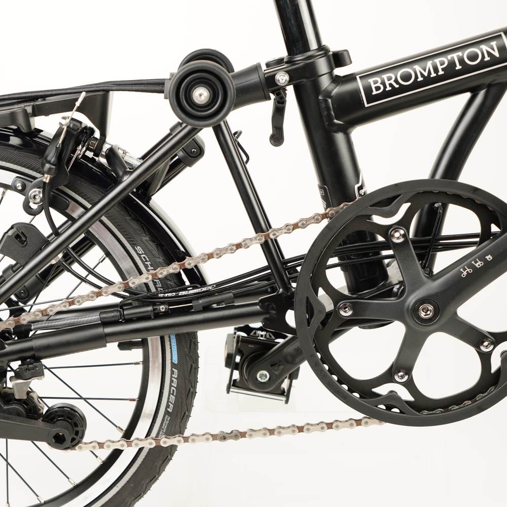 Black leather chain and hook protector for Brompton on the Brompton