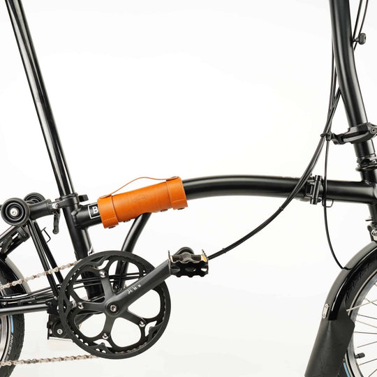 Honey Leather Brompton Carry Handle - Brompton accessories - Souma Leather on black Brompton bike