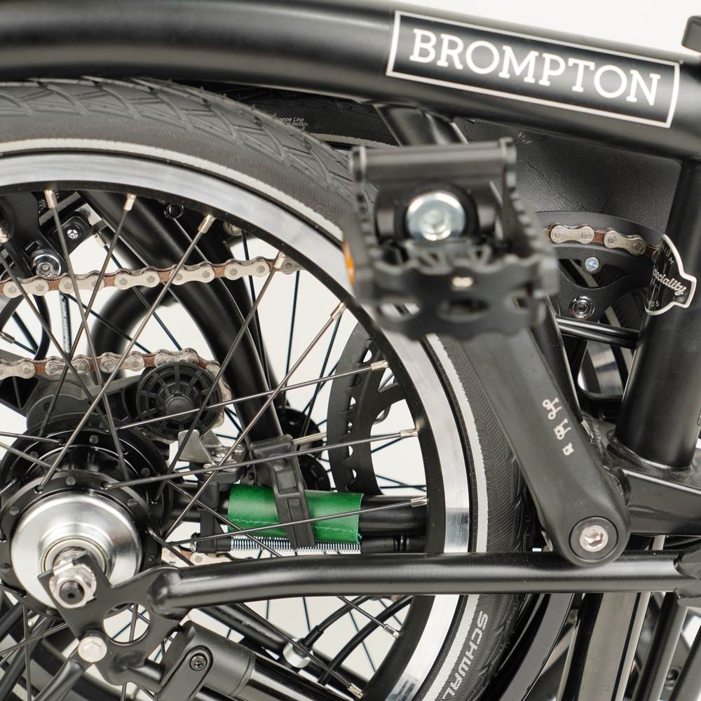 Green leather chain and hook protector for Brompton folded