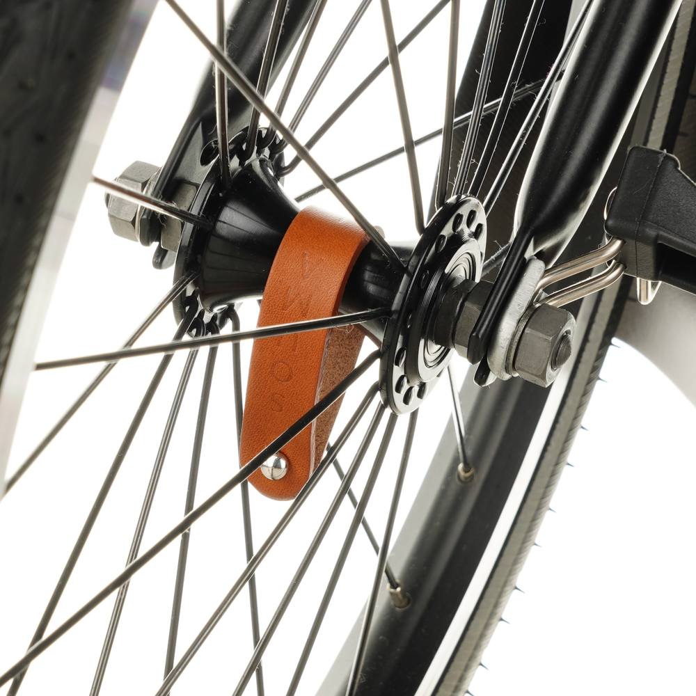 Honey Leather Hub Shiners for Brompton Bicycle - Brompton accessories - Souma Leather - front wheel close up