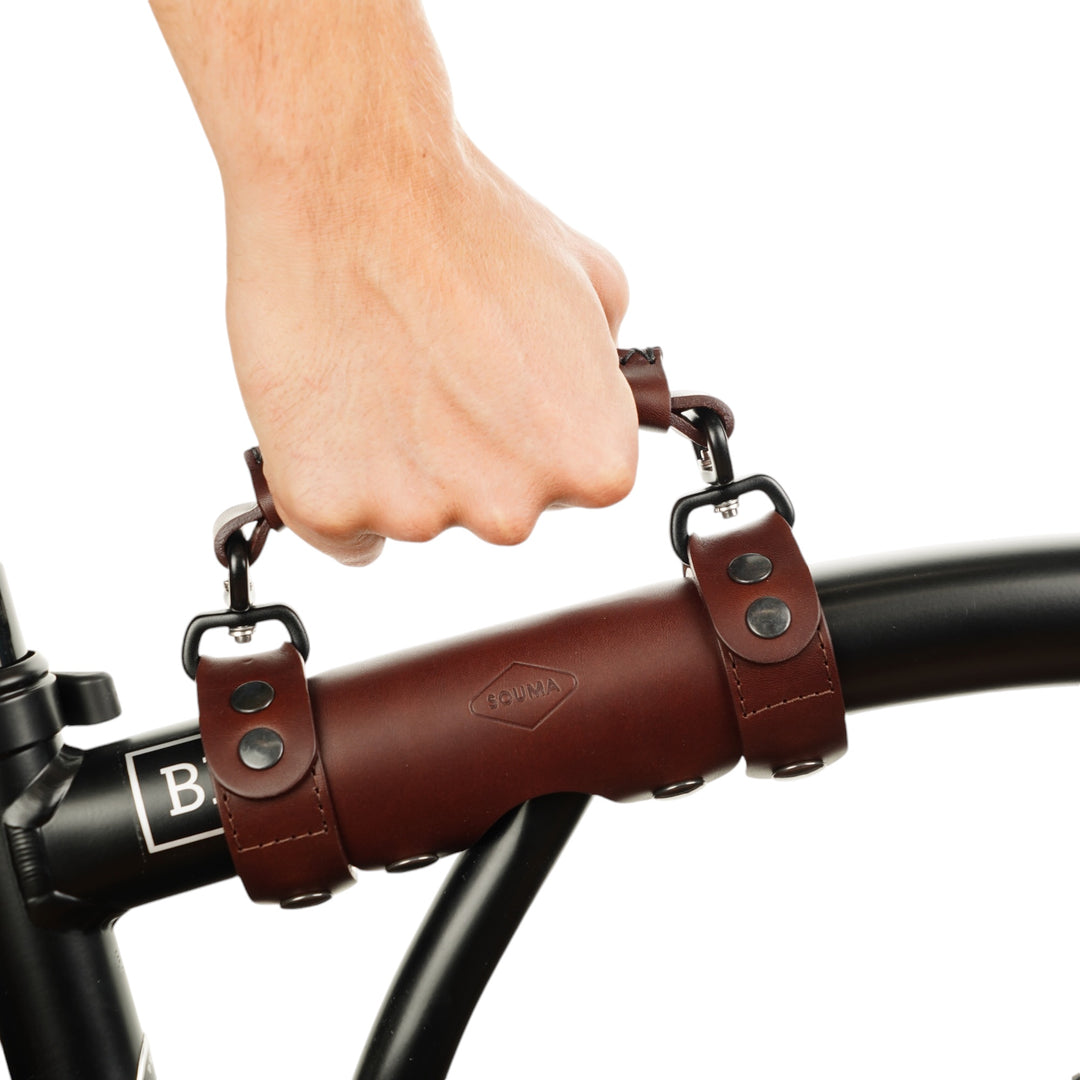 Brompton Heavy Duty Leather Carry Handle brown, side view while using