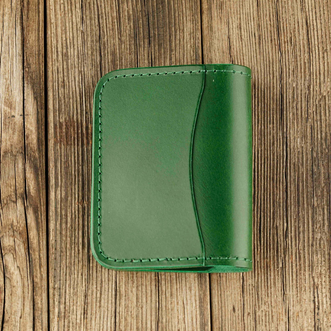 Bifold Apple AirTag Leather Wallet Green wooden background, back side