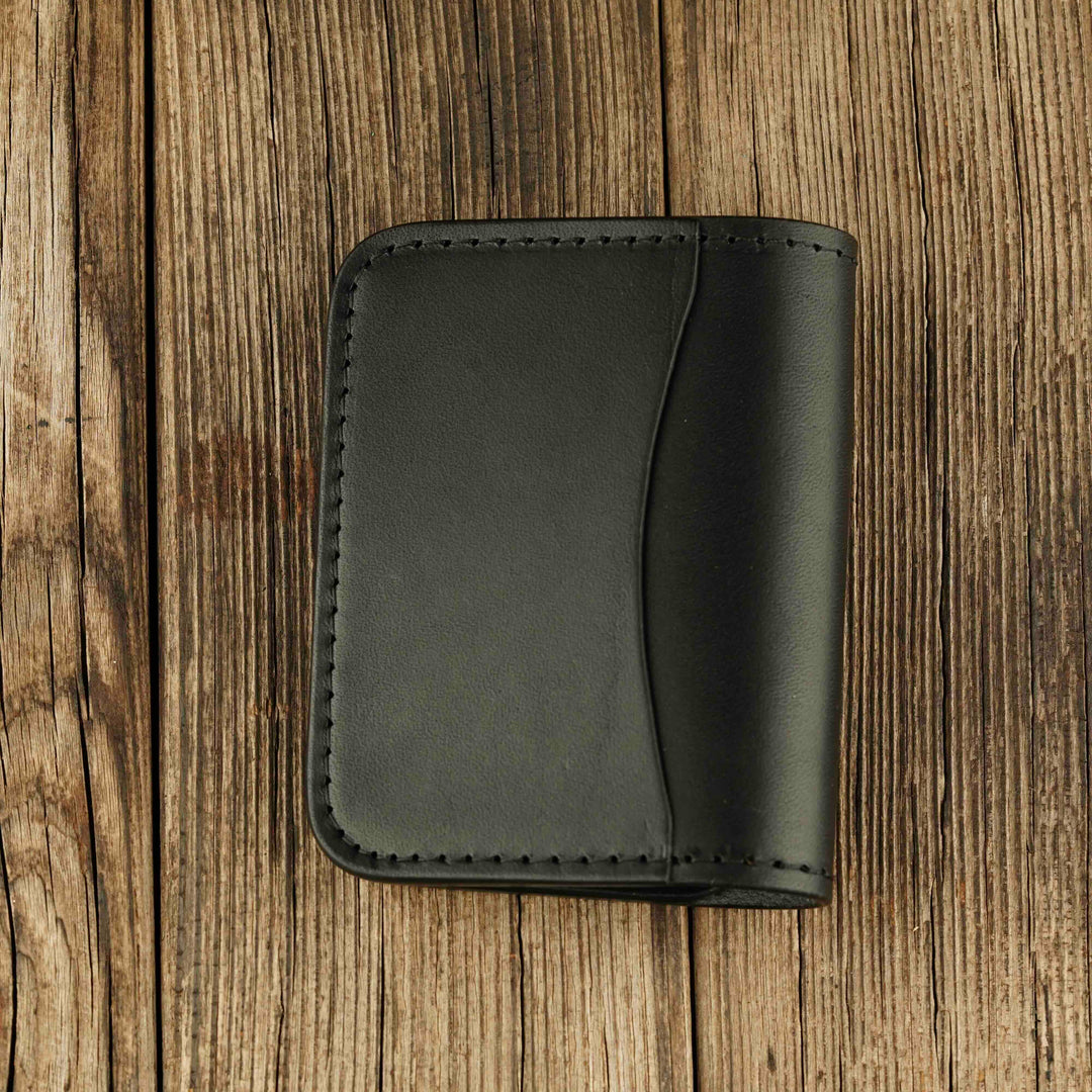 Bifold Apple AirTag Leather Wallet Black wooden background, back side