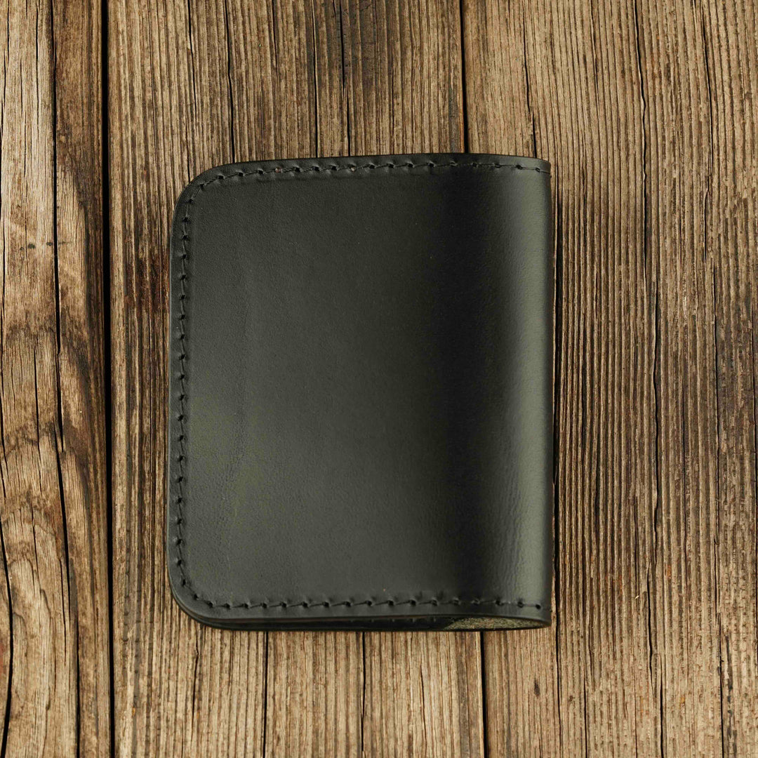 Bifold Apple AirTag Leather Wallet Black wooden background, back side