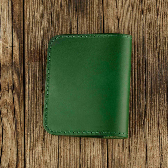 Bifold Apple AirTag Leather Wallet Green wooden background, back side