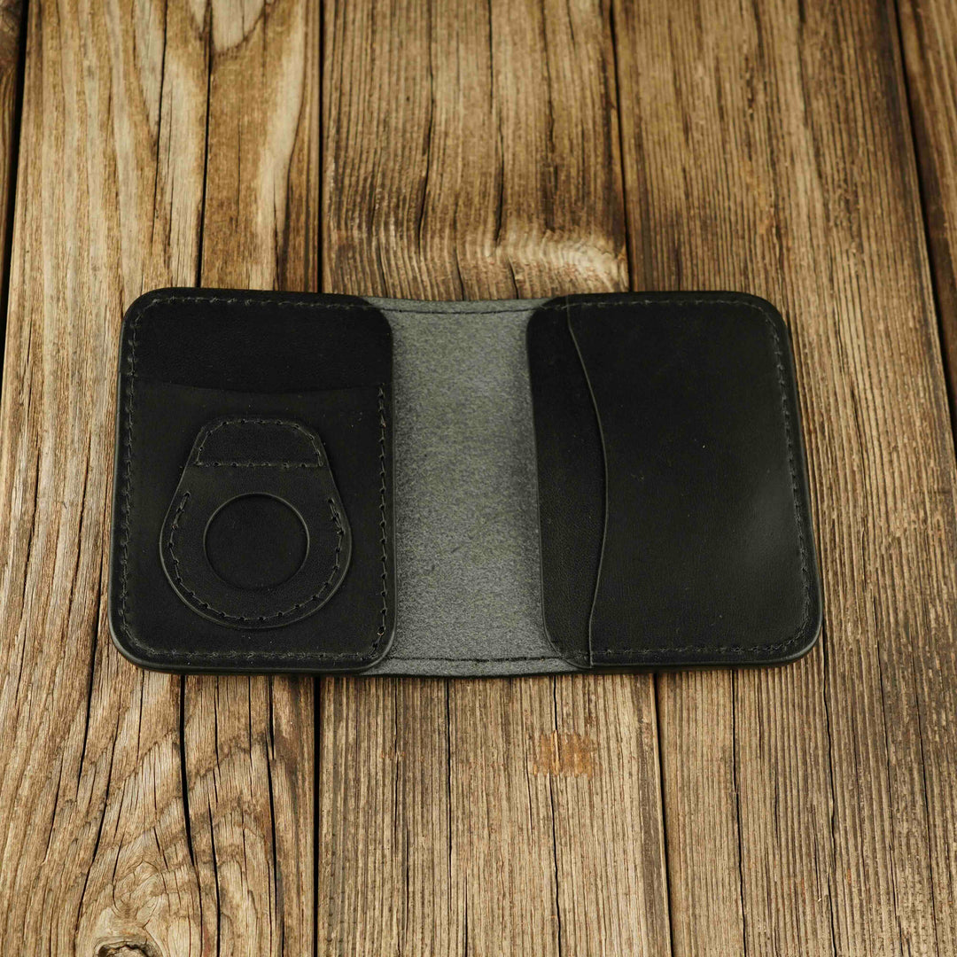 Bifold Apple AirTag Leather Wallet Black wooden background, open, without airtag