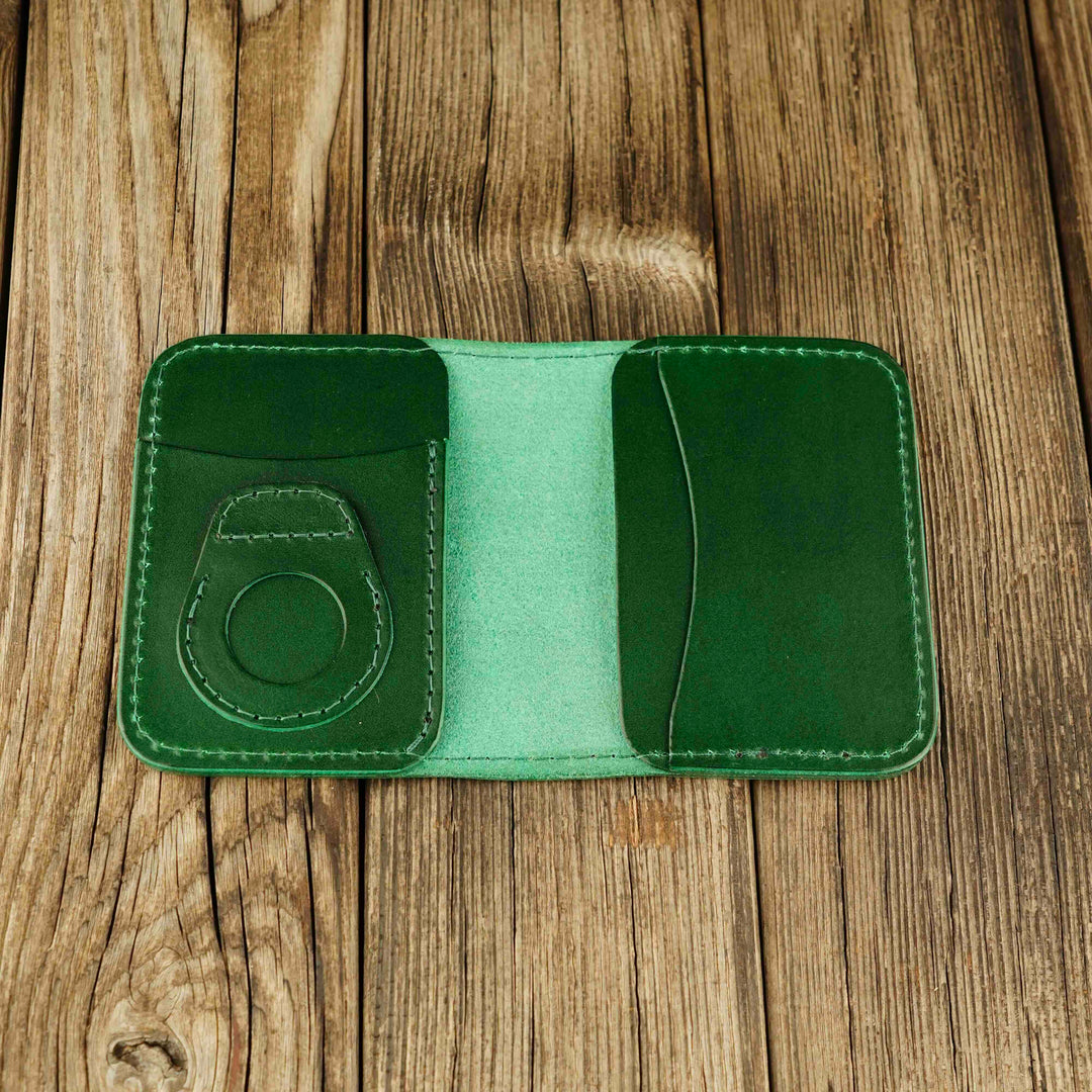 Bifold Apple AirTag Leather Wallet Green wooden background, open, without airtag