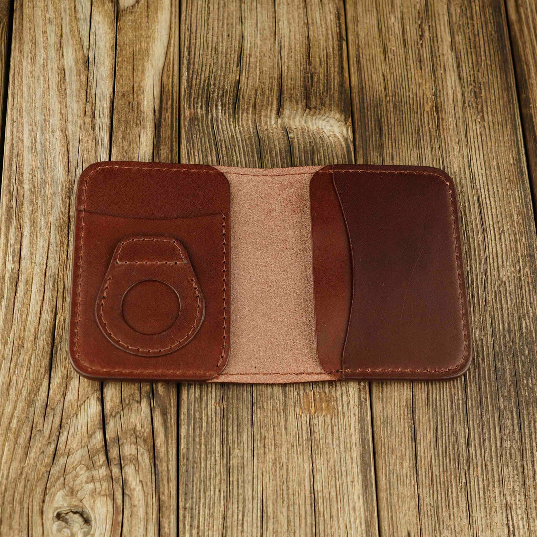 Bifold Apple AirTag Leather Wallet Brown wooden background, open, without airtag