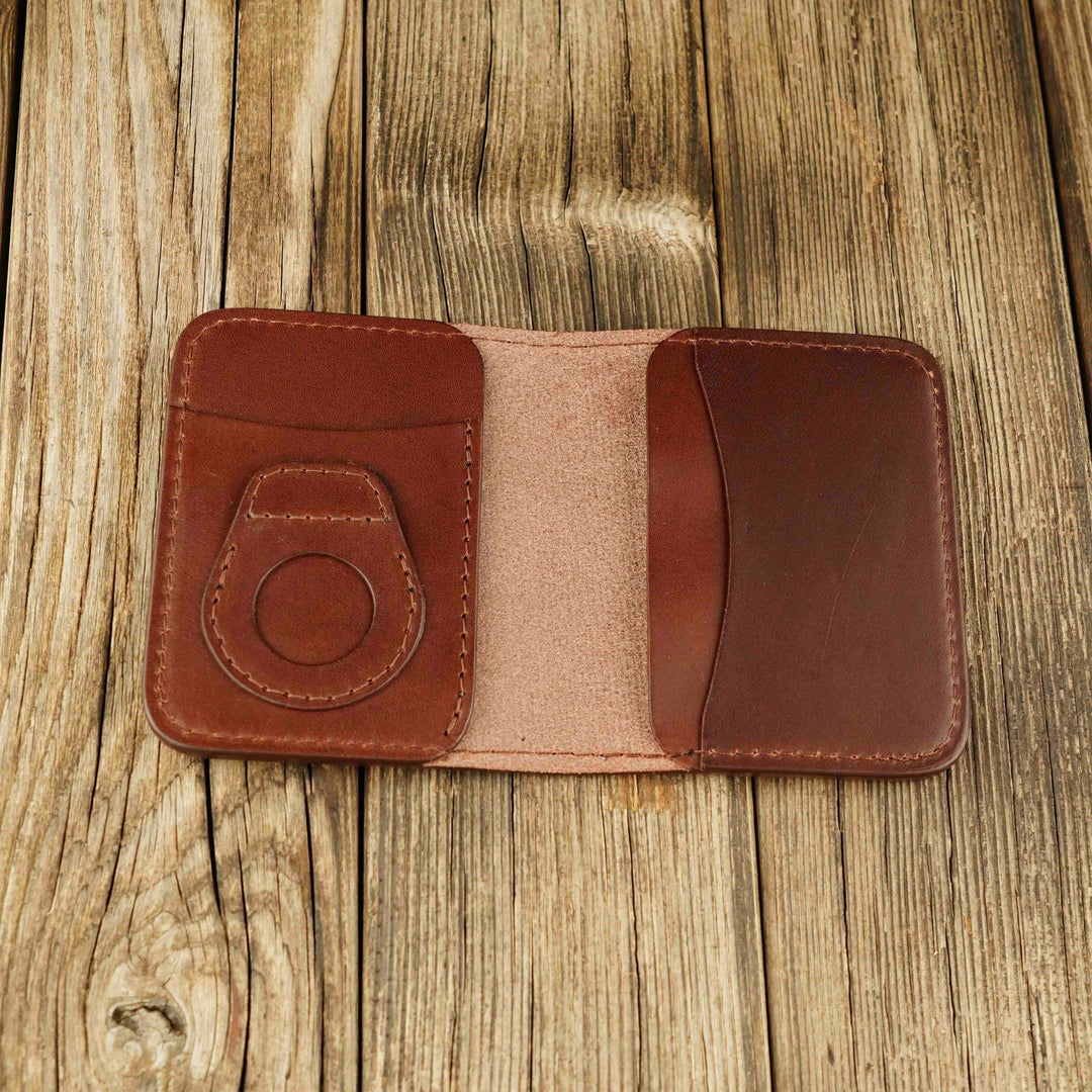 Bifold Apple AirTag Leather Wallet Brown wooden background, open, without airtag