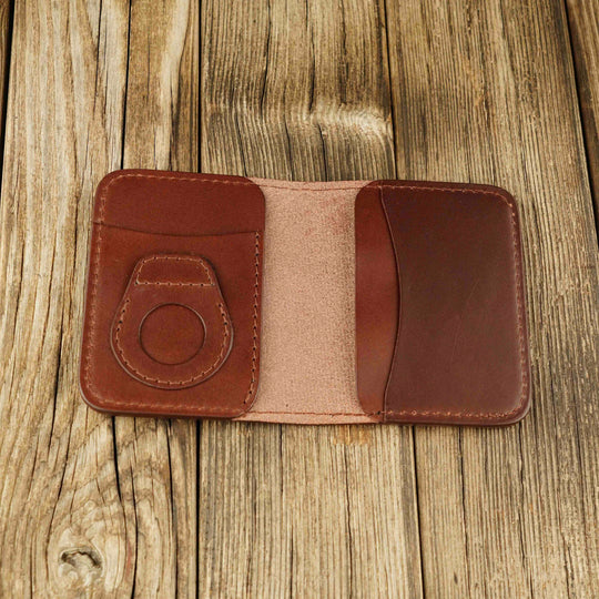 Bifold Apple AirTag Leather Wallet Brown wooden background, open, without airtag