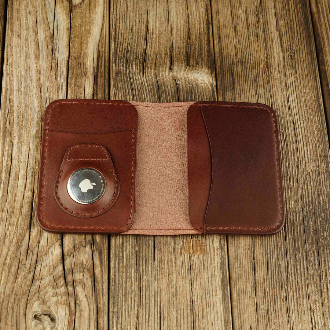 Bifold Apple AirTag Leather Wallet Brown wooden background, open, with airtag