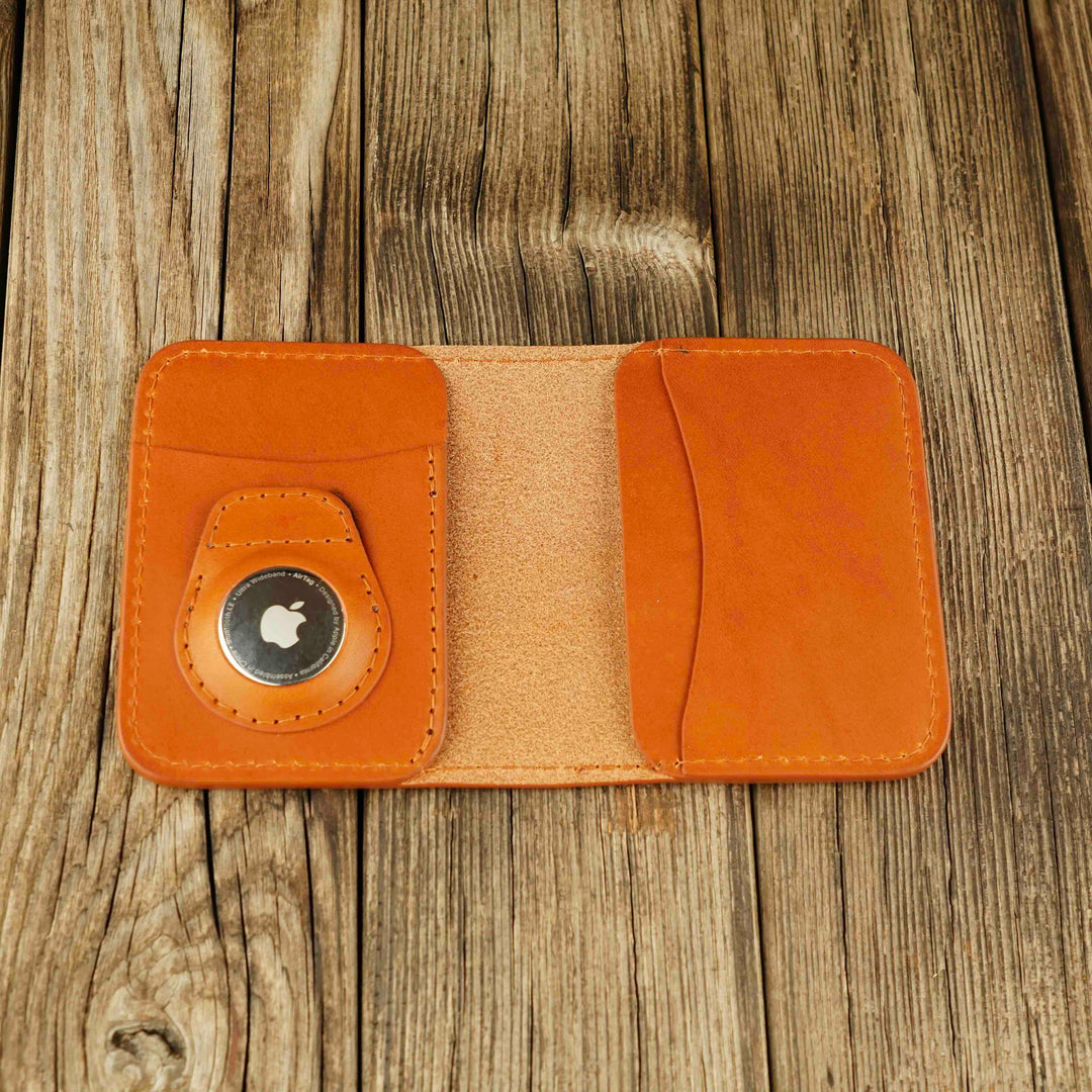 Bifold Apple AirTag Leather Wallet Honey wooden background, open, with airtag