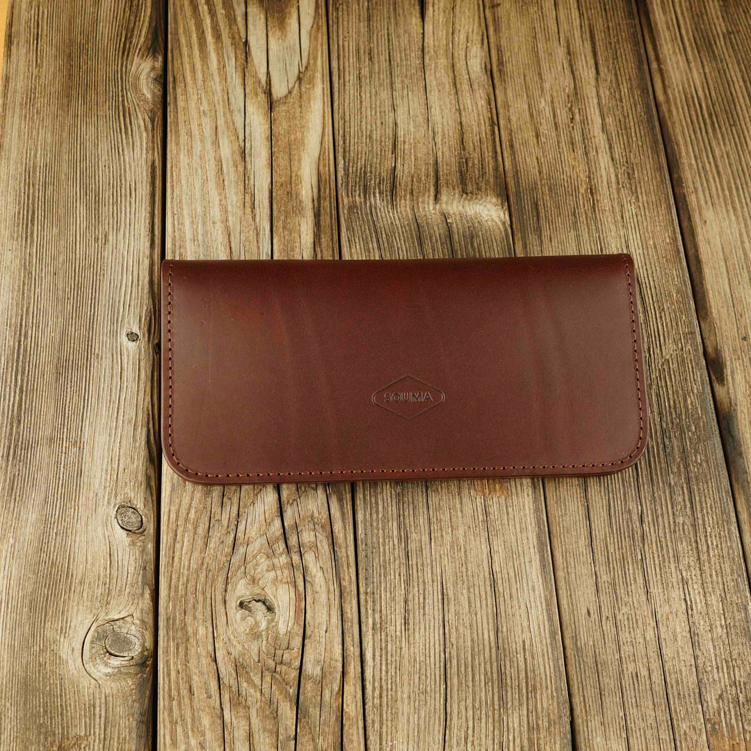 Women's Leather Wallet - Fold Souma Leather Brown, closed, wooden background