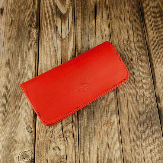 Women's Leather Wallet - Fold Souma Leather Red, wooden background