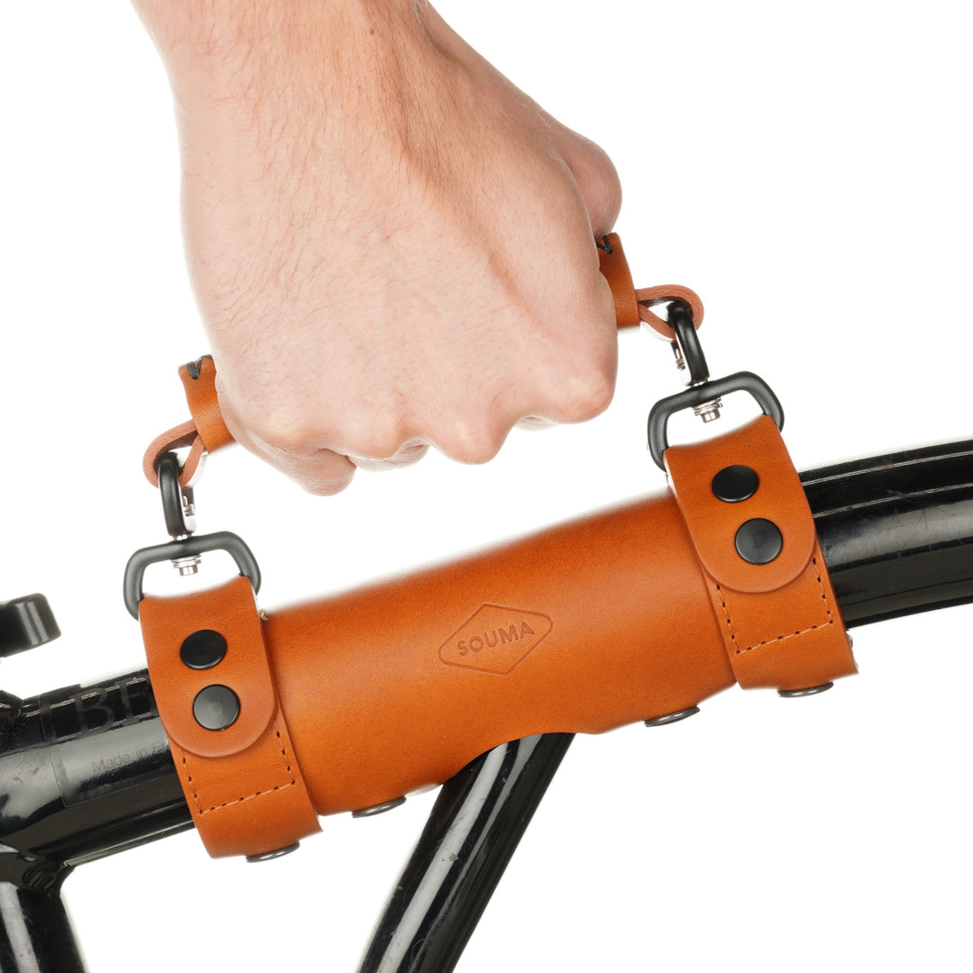 Brompton Heavy Duty Leather Carry Handle honey, side view while using