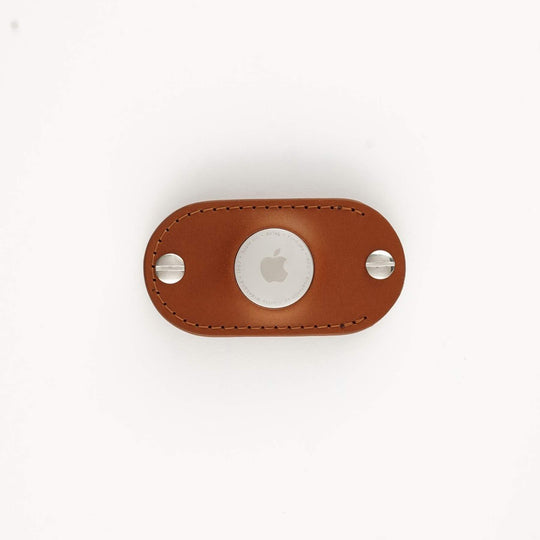 Honey leather AirTag key organizer white background